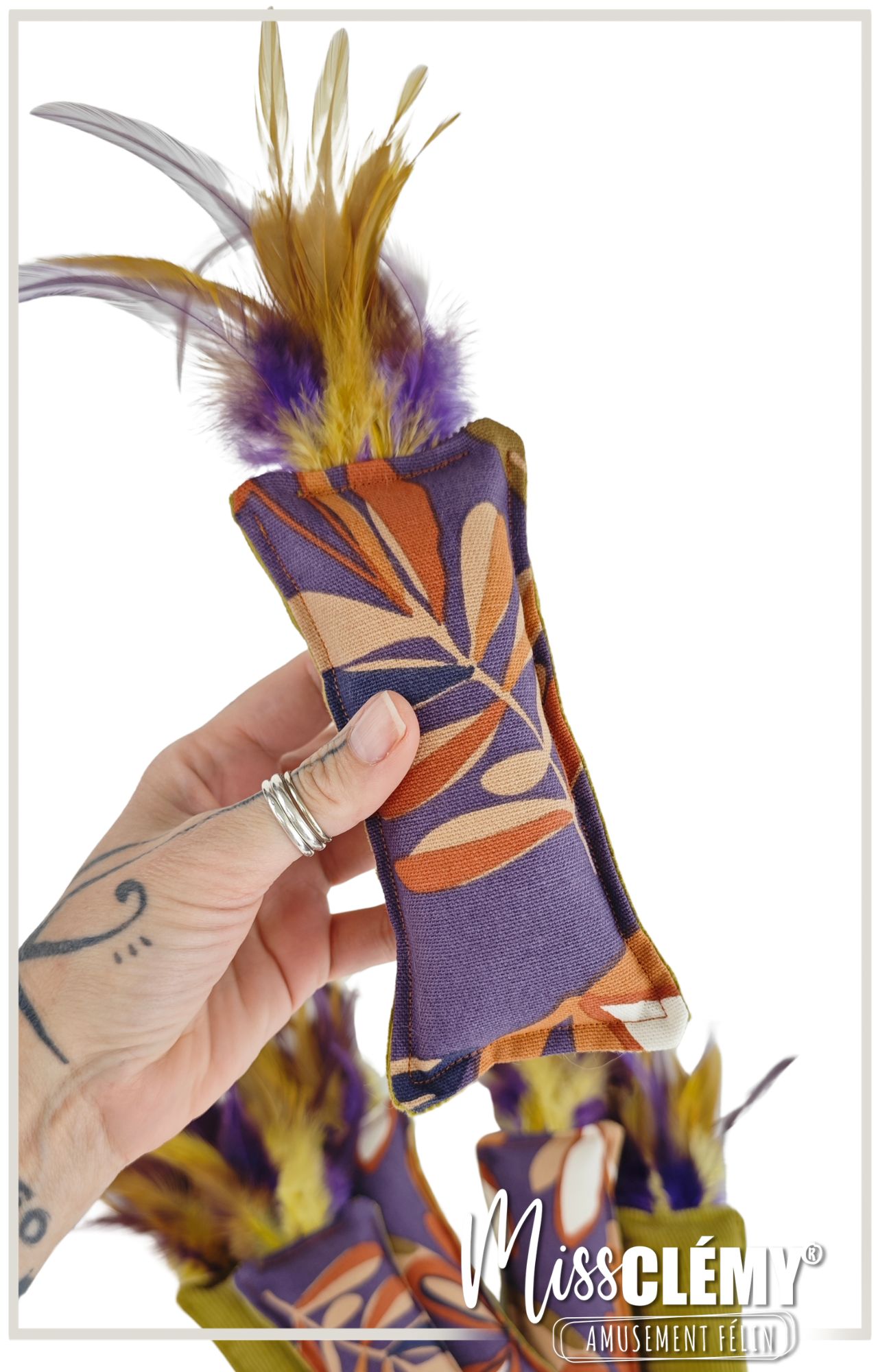 jouet à frapper avec plumes et imprimé violet pour chat